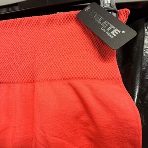 NWT Yelete Vibrant Coral Fleece Lined Leggings One Size